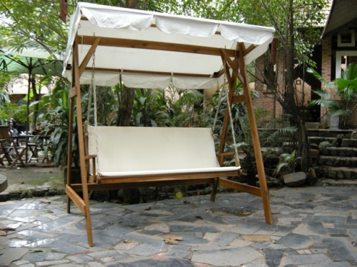 Dondolo in acacia con cuscino